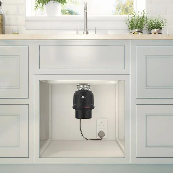 Drvič odpadu InSinkErator Premium 550 EC chrómové tlačidlo