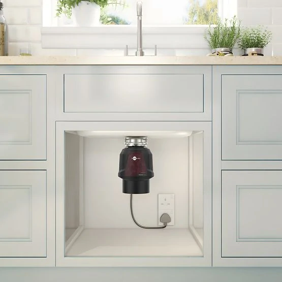 Drvič odpadu InSinkErator Premium 700 EC chrómové tlačidlo